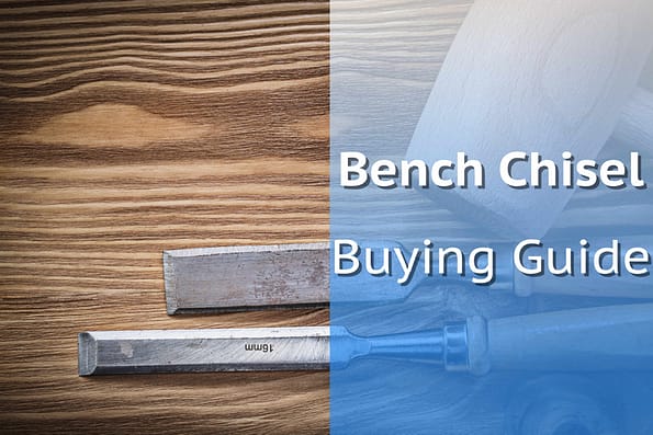 Pair Of Bench Chisels On Wooden Board